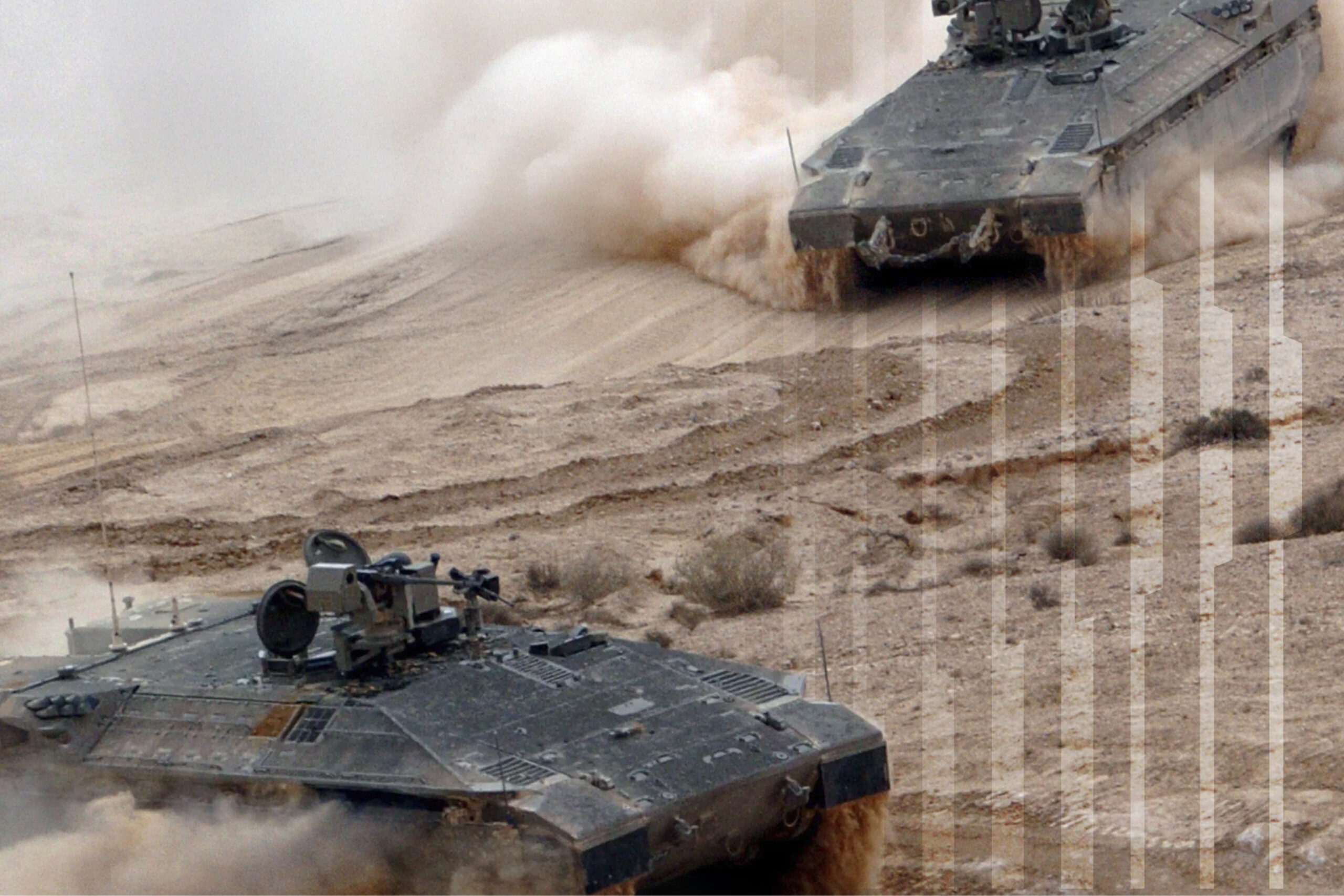 Two armored military vehicles driving at high speed through a desert landscape, kicking up large clouds of sand and dust.